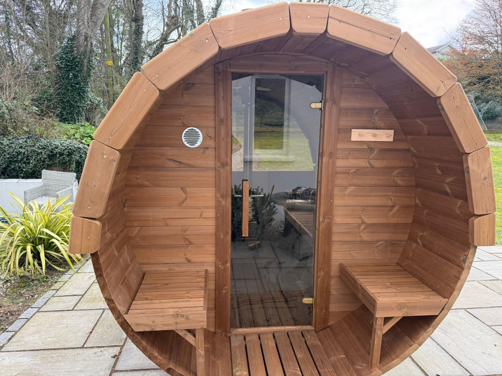Sauna interior with benches and stove 10