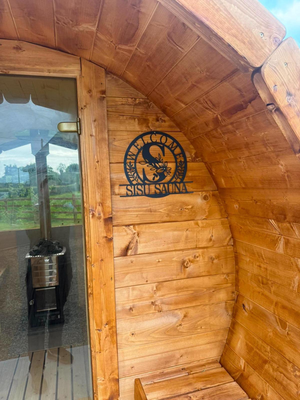 Sauna interior with benches and stove 4