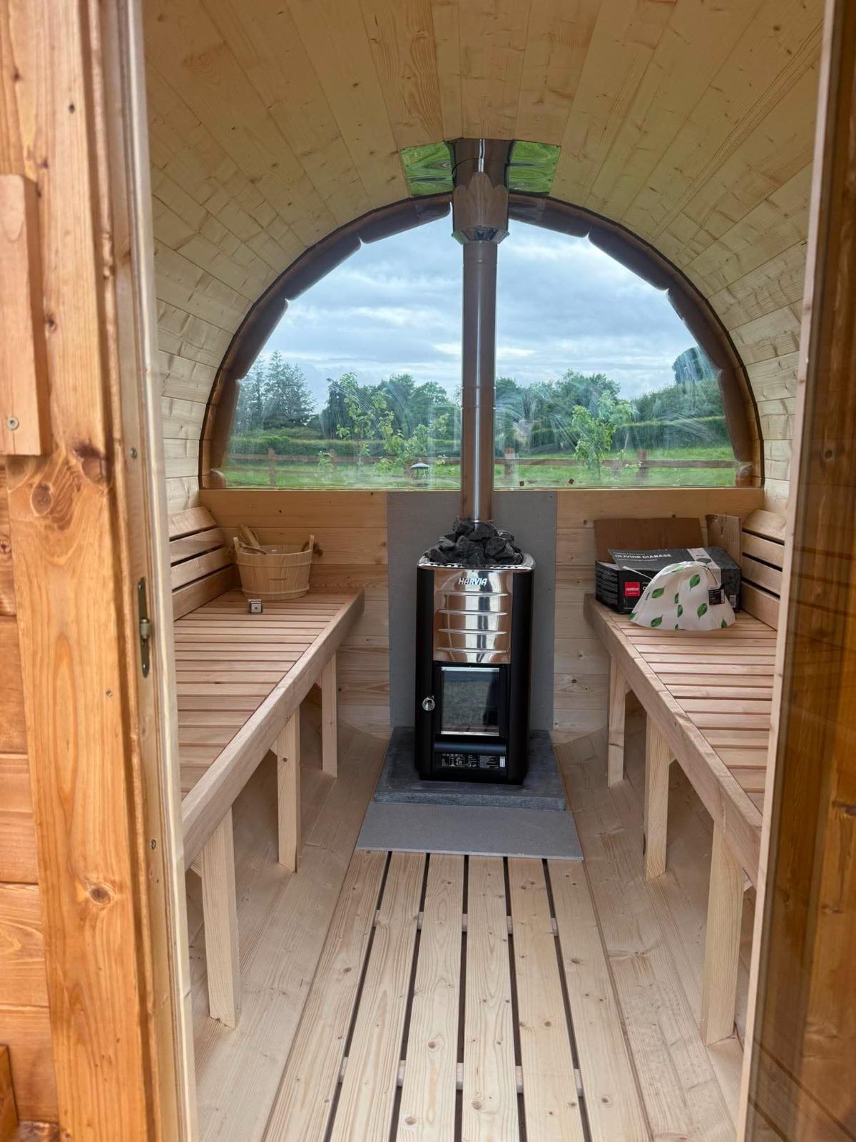 Sauna interior with benches and stove 5