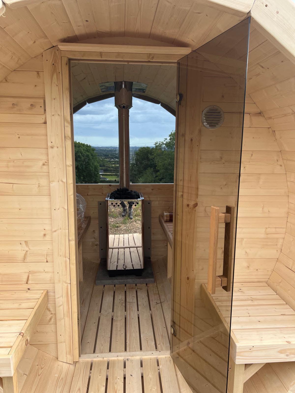 Sauna interior with benches and stove 8